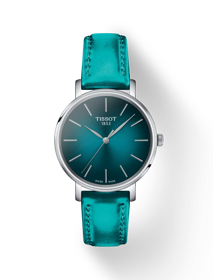 Vista frontal del reloj Tissot Everytime 34mm con sombra