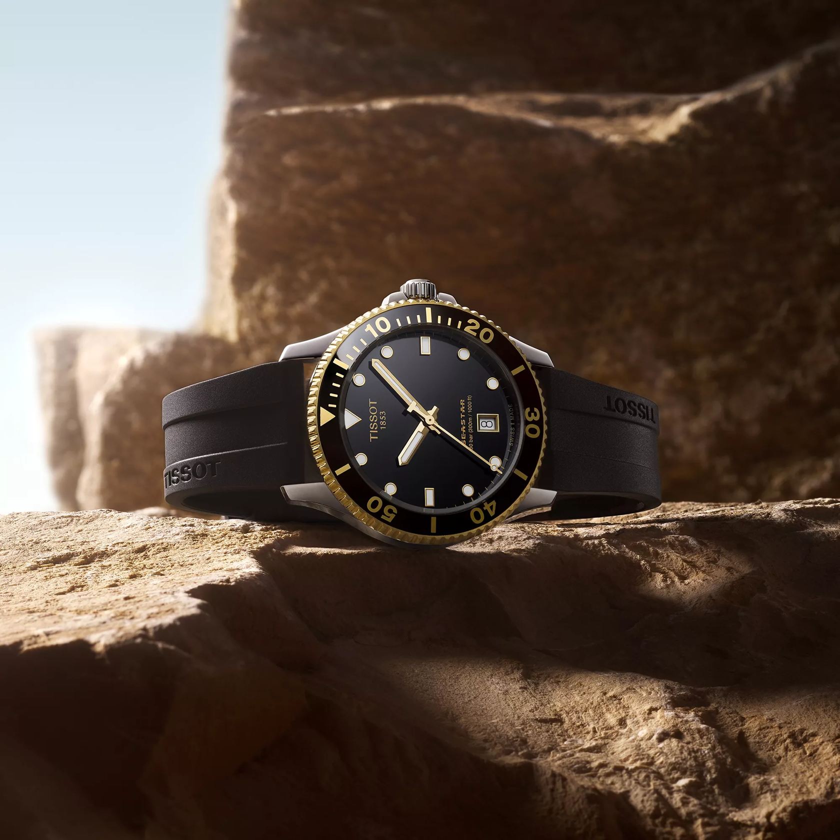 Tissot Seastar 1000 40mm watch on a colored background