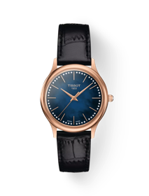 Front view of the watch Tissot Excellence Lady 18K Gold with shadow